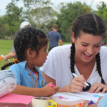 During a day of VBS Courtney colors with village girls and chats with them about their love for things people and God