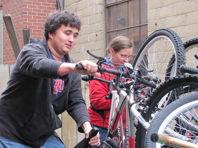 Sorting bikes at Center of Hope.
