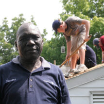 Students repair a roof of a local Sudanese Church.