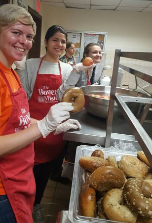 Serving breakfast at a homeless shelter